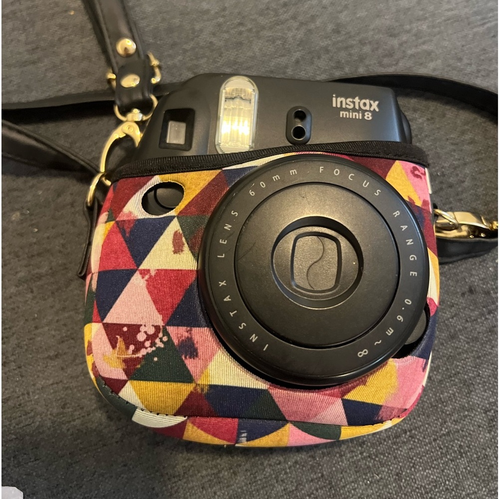 instastax camera with 4 packs of film